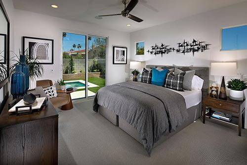 bedroom in the Plan Three at The QUE by Woodbridge Pacific Group