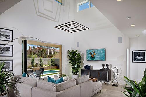 living room in the Plan Three at The QUE by Woodbridge Pacific Group