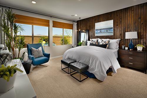 vertical tongue and groove paneling in bedroom by Chameleon Design