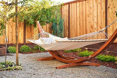 teak hammock in backyard by Chameleon Design