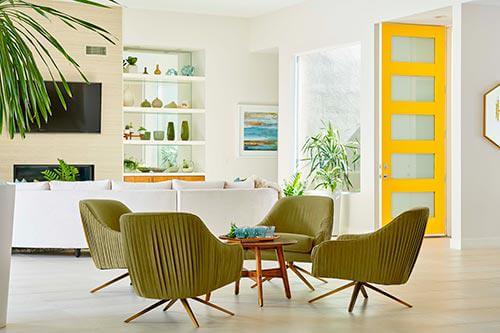 curved green armchairs by Chameleon Design