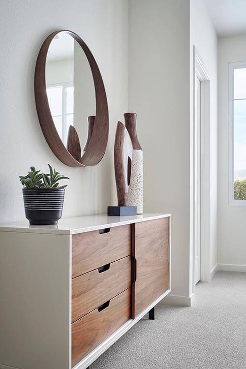 curved detail on entryway table by Chameleon Design