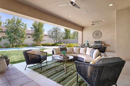 green textured rug on covered patio by Chameleon Design