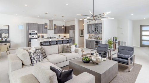 kitchen and living room at Iridium Plan 3 in Rancho Mirage, California