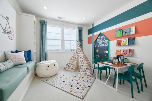 colorful stripes in kid’s playroom with built-in bench by Chameleon Design