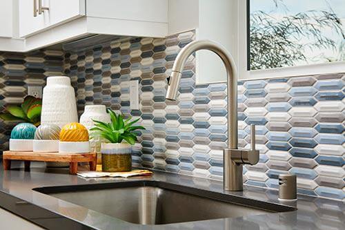 kitchen tile backsplash in blue, gray and white Enliven Van Daele Homes
