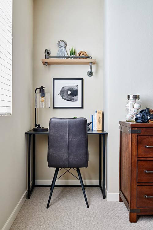 niche workstation with black desk and chair