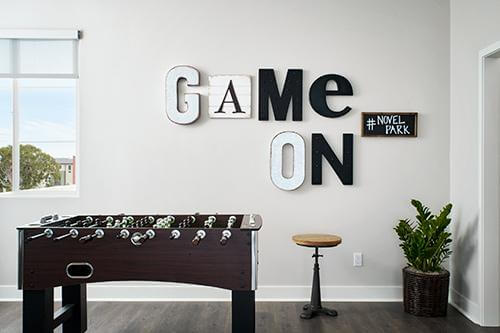 game room with black accents Echo at Novel Park
