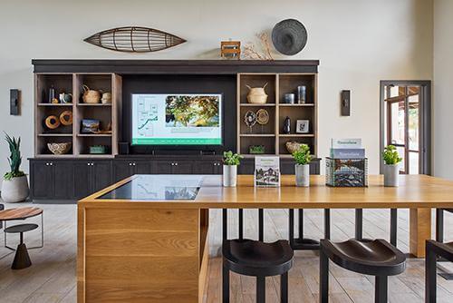 community sales center with black cabinets Riverstone
