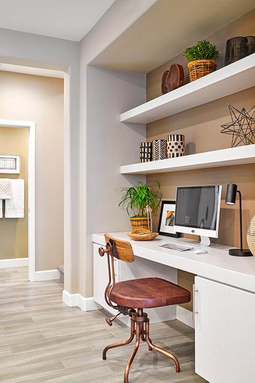 niche workstation with white built-in cabinets and shelves Citrus + Palm