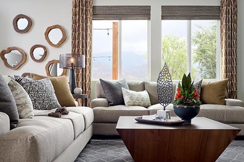 light brown sofa with tonal solid and printed pillows Rancho Palma Rioja