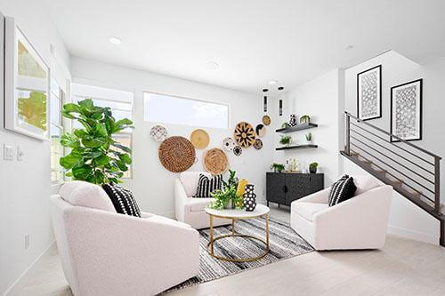 white and neutral seating area with stairs