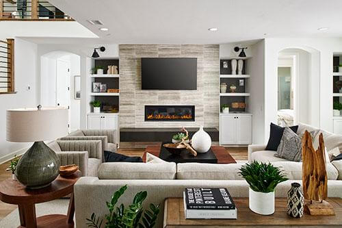 contemporary living room with wall mounted tv and built in shelving