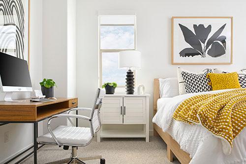 fresh white bedroom with office nook