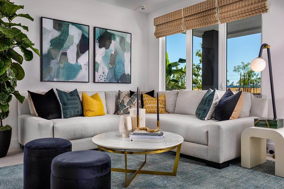 modern living room with abstract art and sectional