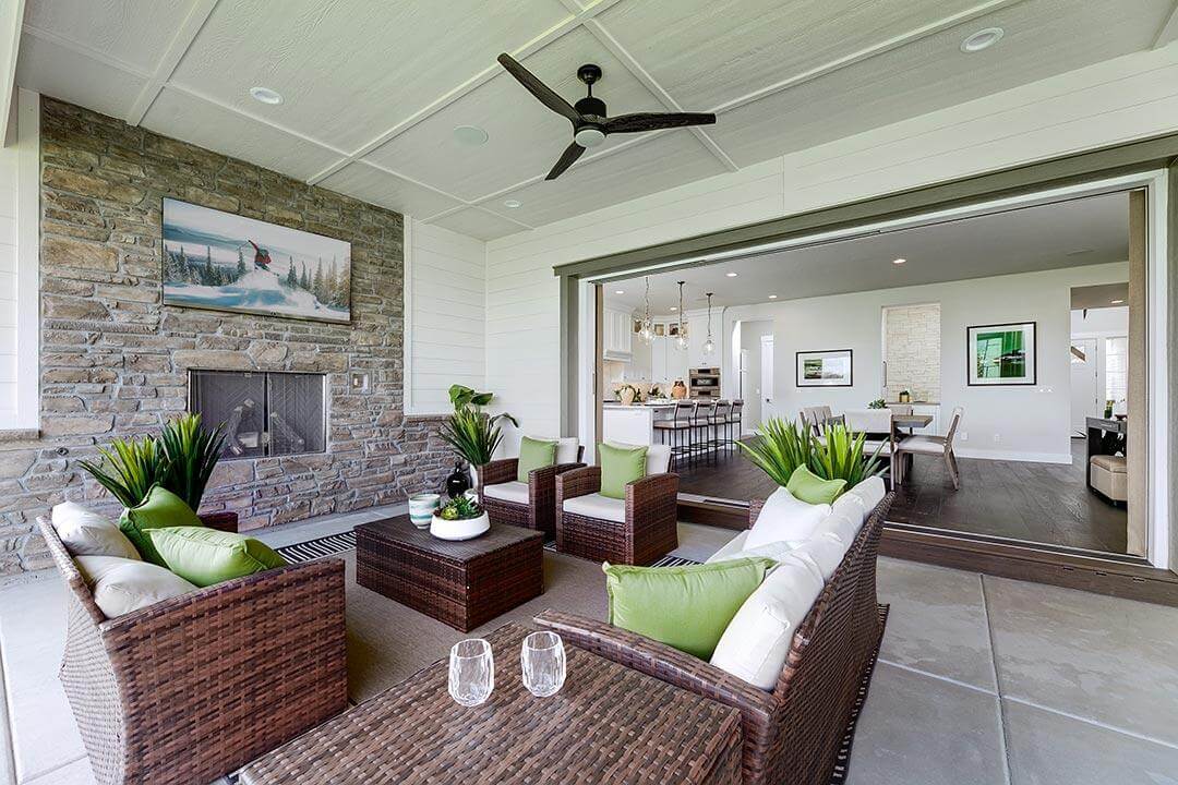 covered outdoor living room with fireplace