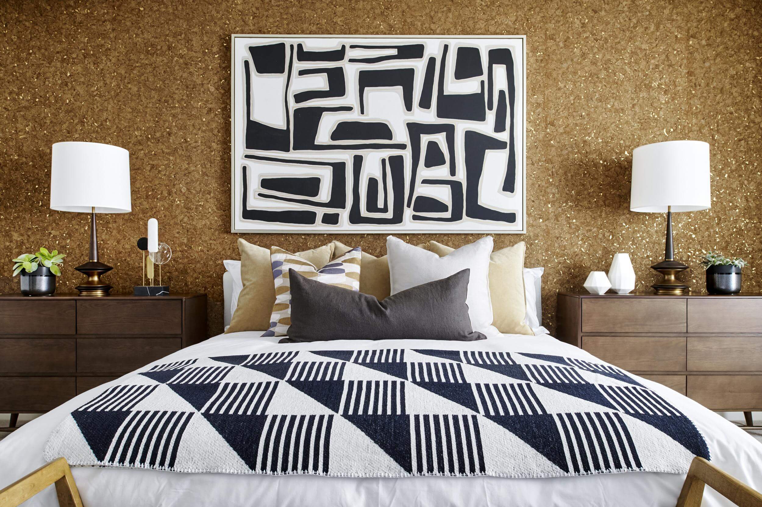 brown bedroom with retro black and white arts