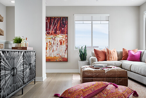 modern living room with pink and orange accents