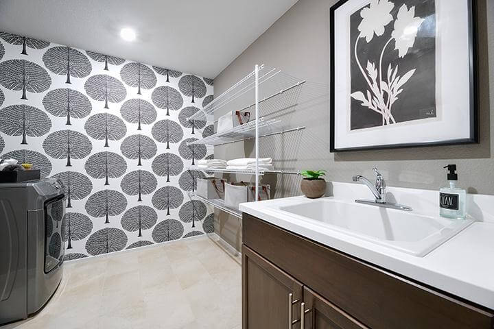 laundry room with black and white florals