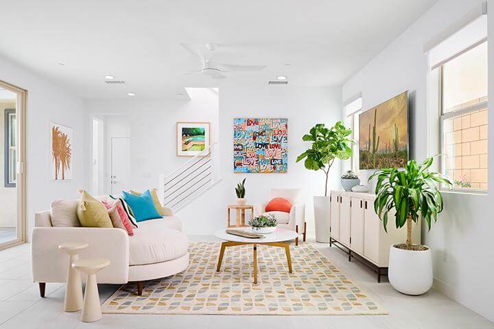 white living room with gold accents