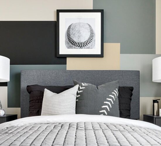 bedroom with gray monochrome statement wall