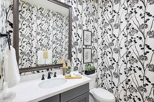 powder room with floral wallpaper