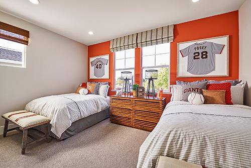 bedroom with orange statement wall
