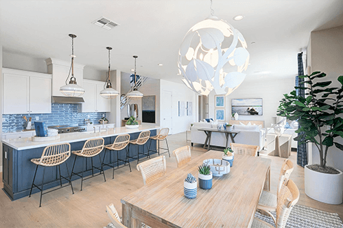 a dining room with a circular chandelier