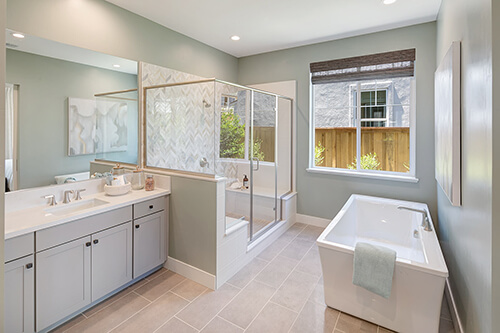 bright and airy primary bathroom