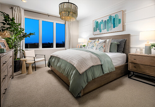 a fenced chandelier in a soft bedroom
