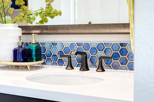 bathroom with blue-shaded tiles
