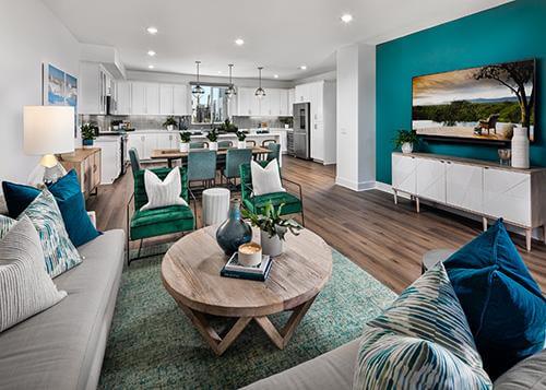 blue and green living room with cool wood accents