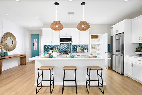 bright kitchen with wicker pendant light fixtures
