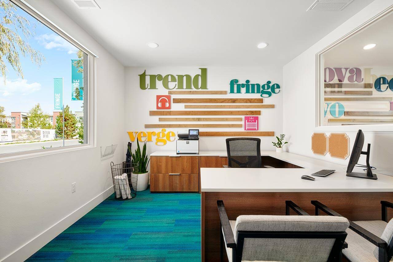 sales office with colorful accent wall
