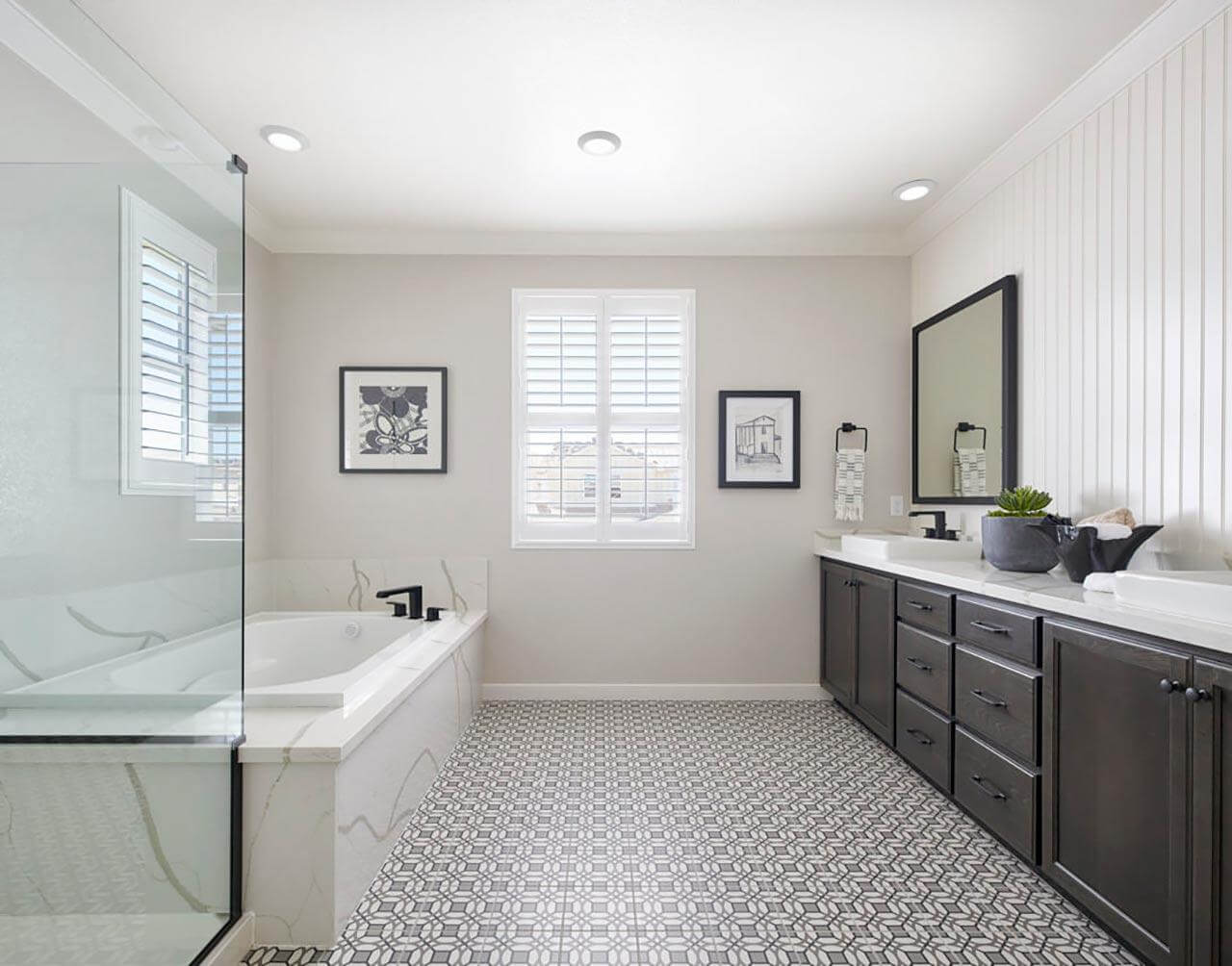 large primary bathroom with small tile flooring