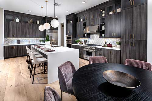 spacious kitchen with dark cabinetry