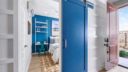 blue barn door to guest room
