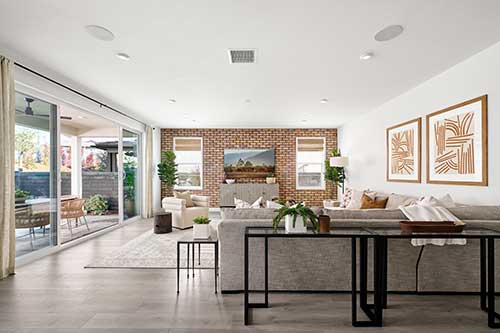 living room with brick statement wall