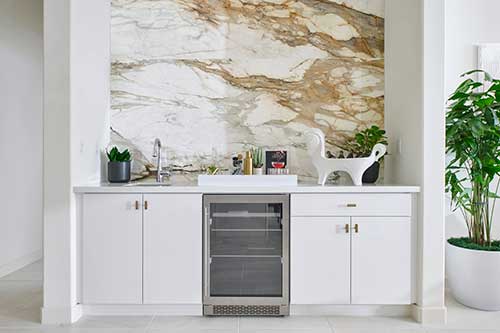 home bar with marble statement wall