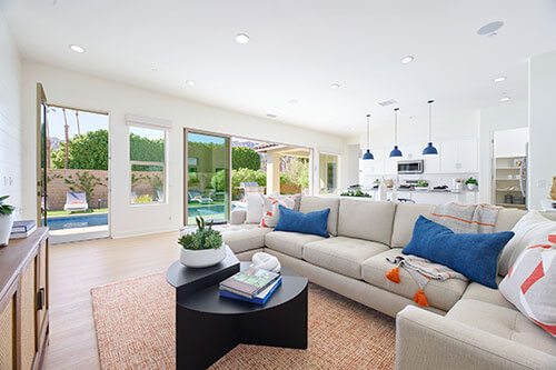bright living room with sliding doors to backyard
