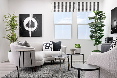 black and white living area with modern art