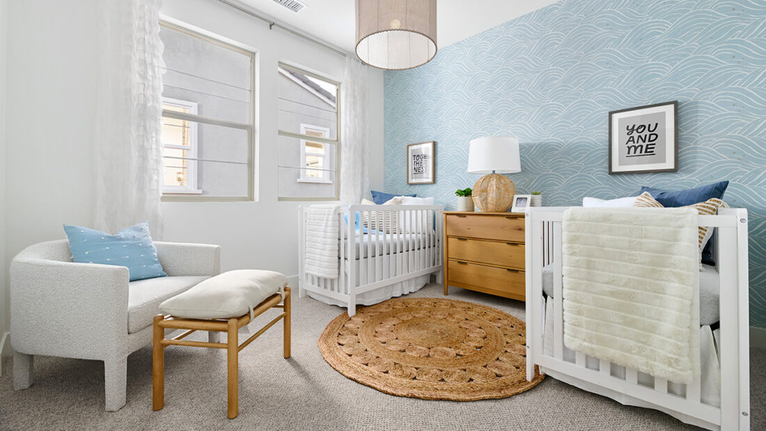 nursery with pale blue statement wall