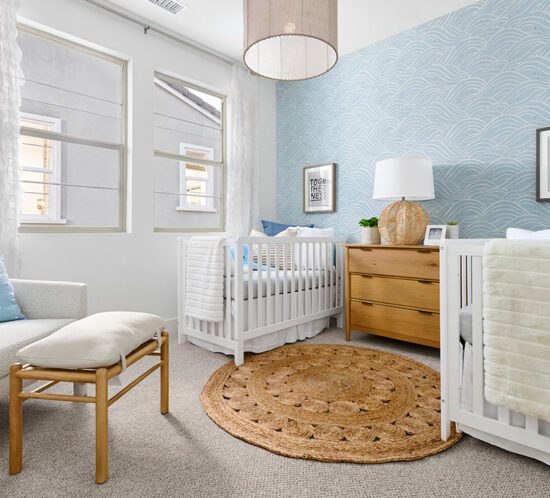 nursery with pale blue statement wall