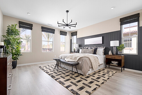 large bedroom with black and white decor