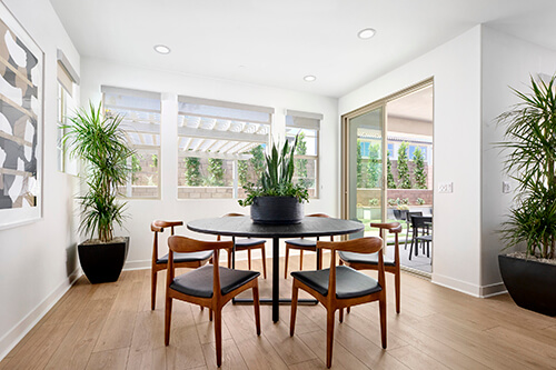 dining room with large windows and sliding doors