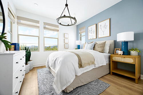 bright bedroom with blue and brown accents