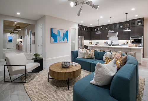 living room with teal sectional